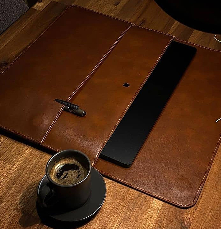 leather bag and coffee cup