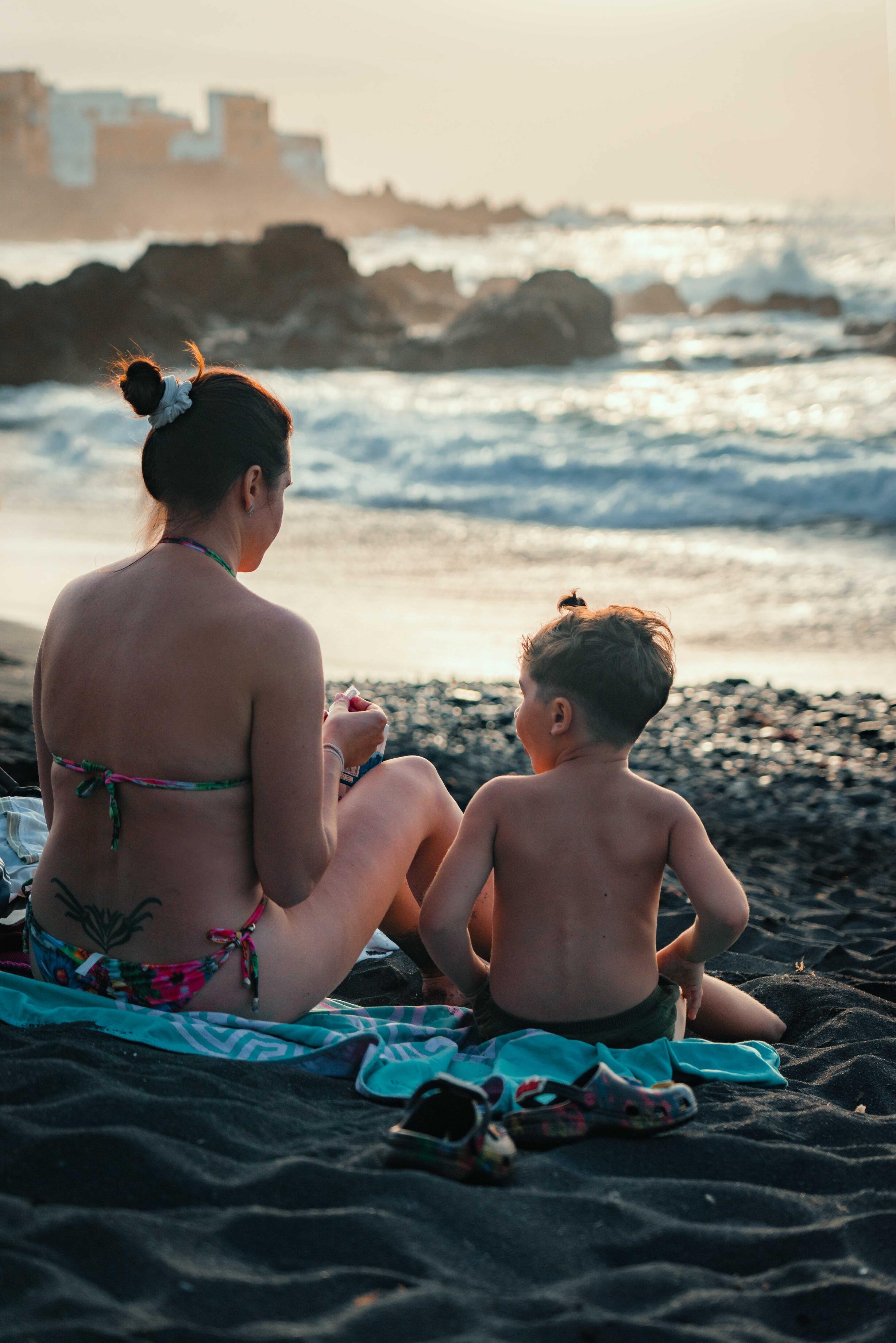 Mother and son on the beach